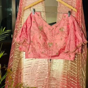 House of Hariya: Chic Cutdana Ruffle Blouse & Pink Saree